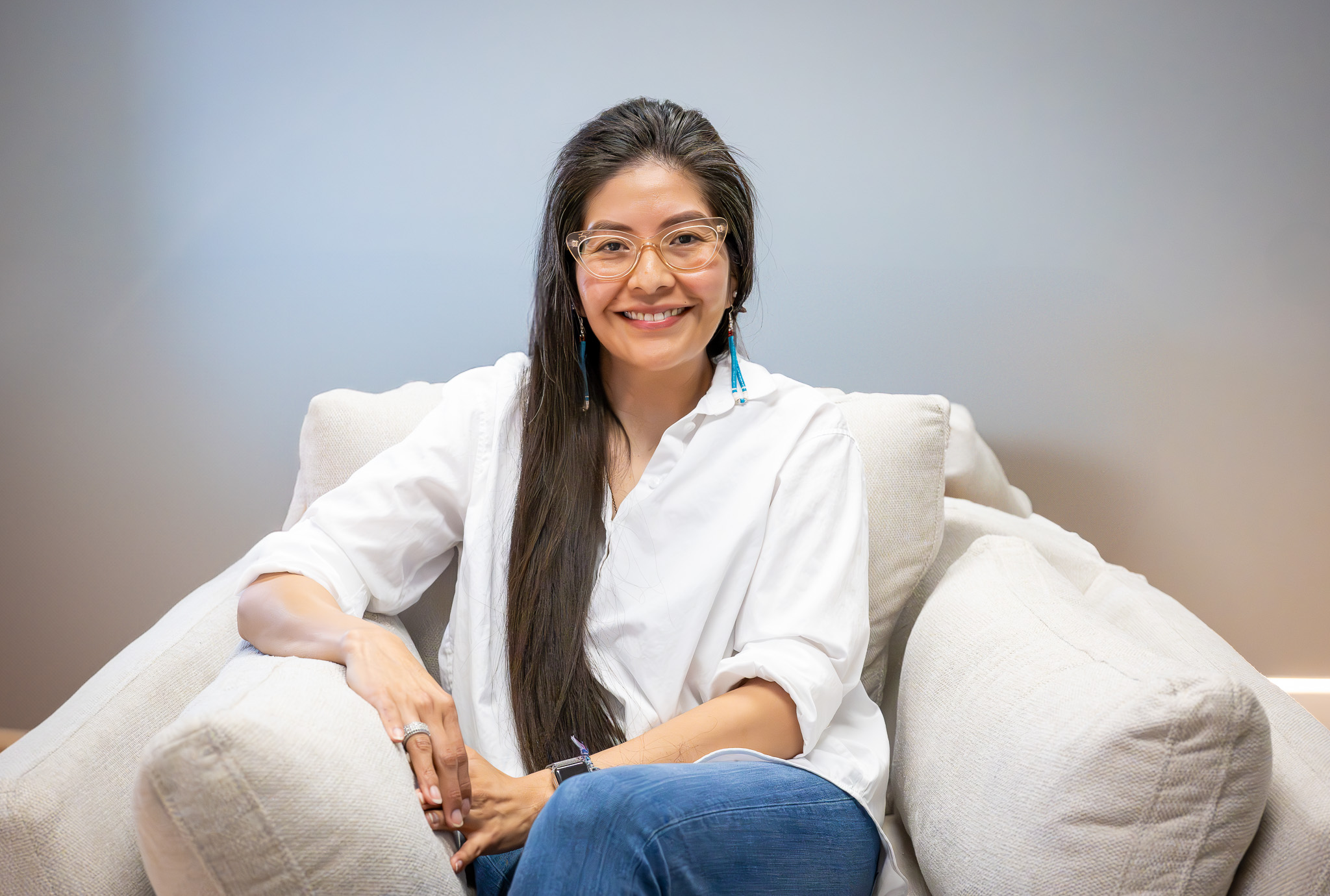 NATIVation Counseling clinician seated in a therapy office